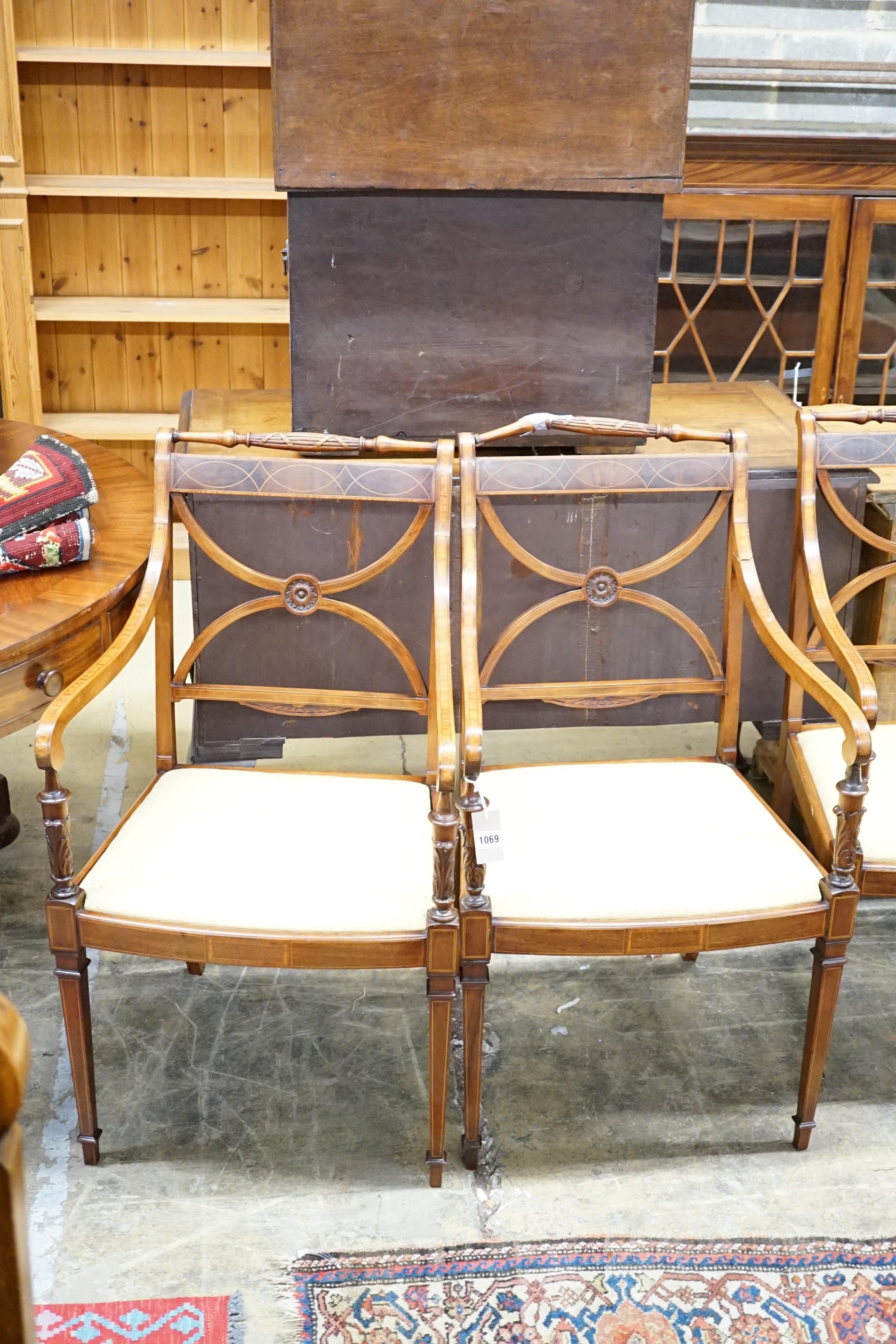 A set of four Sheraton revival inlaid mahogany salon chairs, width 52cm, height 93cm